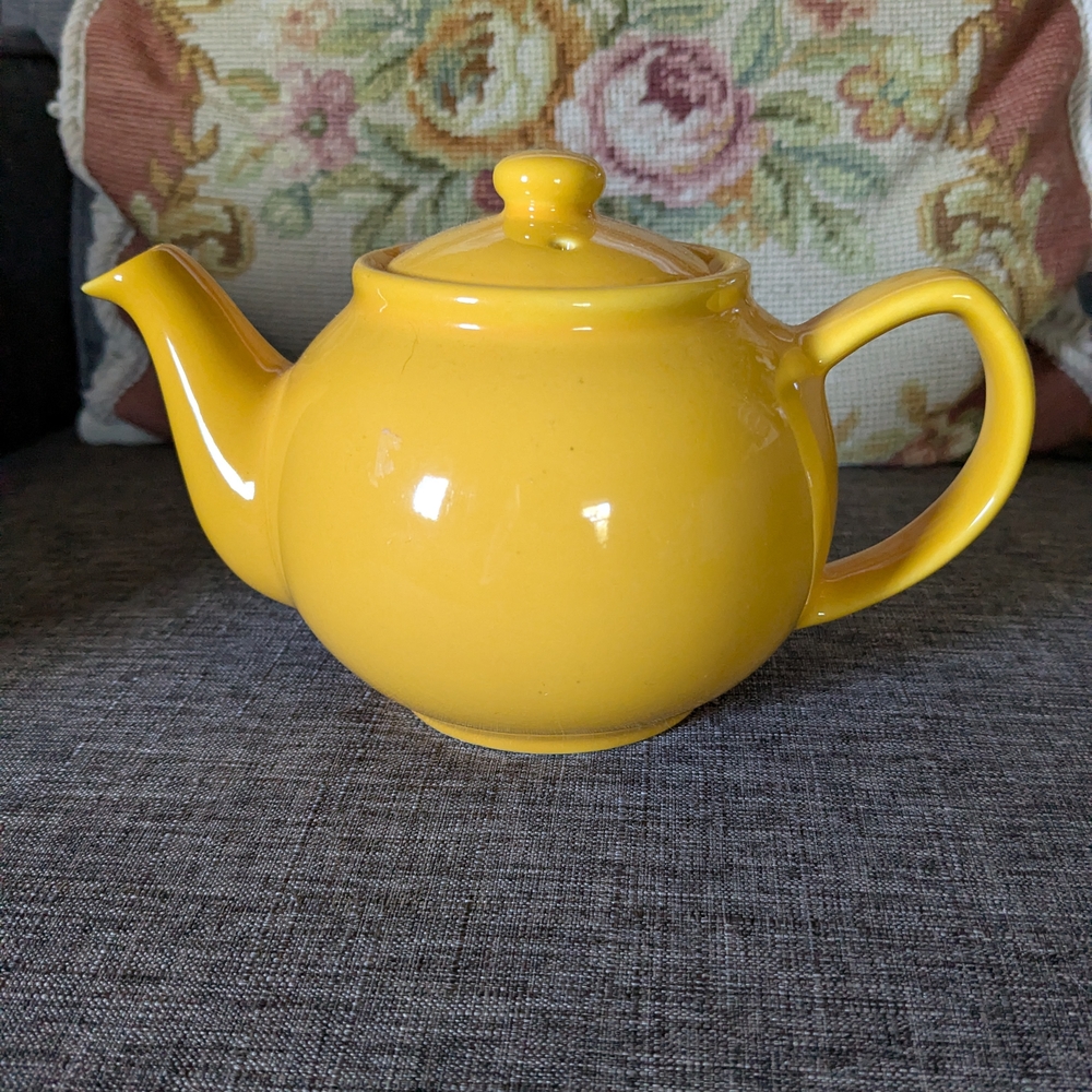 Beautiful Yellow Ceramic Teapot with Glazed Finish.